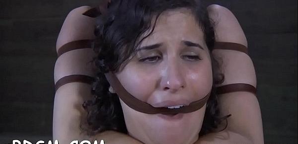  Gagged sweetheart receives rough cunt playing from torturer